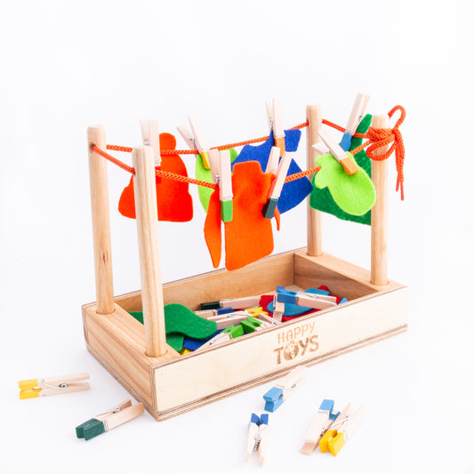 Attīstošā rotaļlieta-sorteris "Knaģējam-spēlējam"