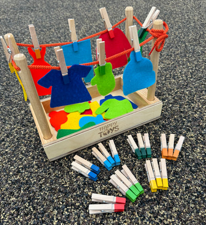 Attīstošā rotaļlieta-sorteris "Knaģējam-spēlējam"